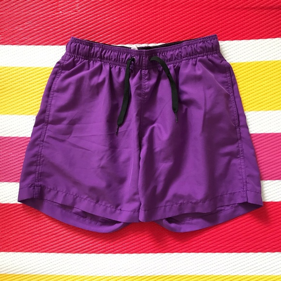 purple swimming shorts